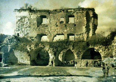 French soldiers in the courtyard of a heavily damaged castle blown up by German soldiers in 1917, Coucy-le-Chateau-Auffrique, Aisne, France by Fernand Cuville